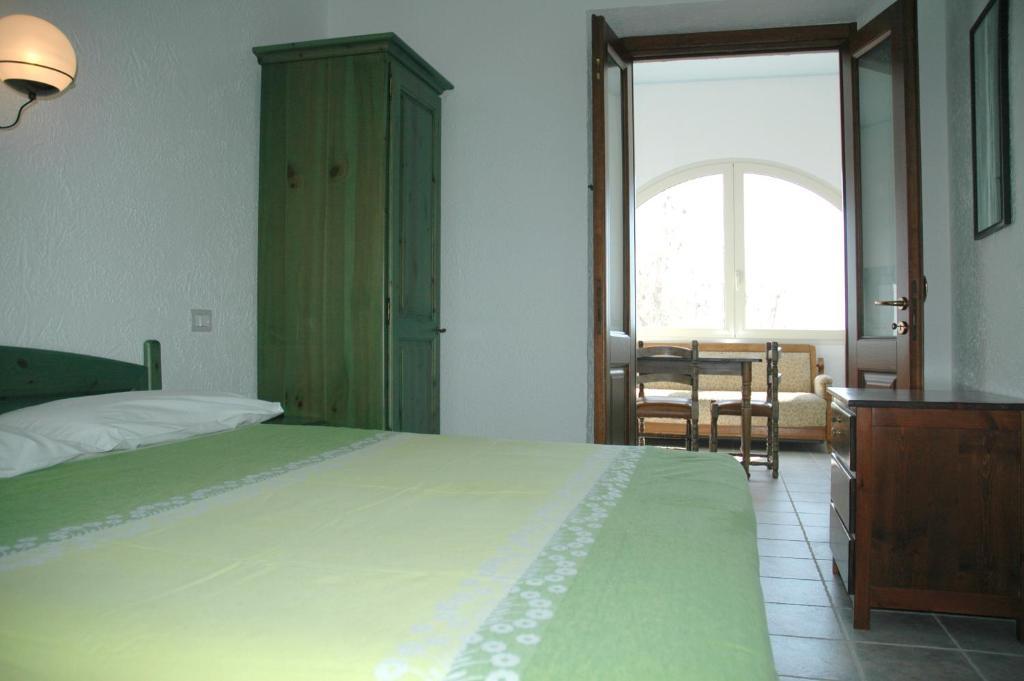 Acacia Appartamenti Cala Gonone Kamer foto